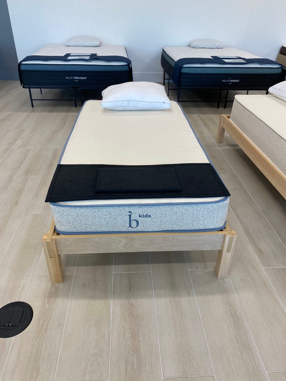 a birch kids mattress in a showroom