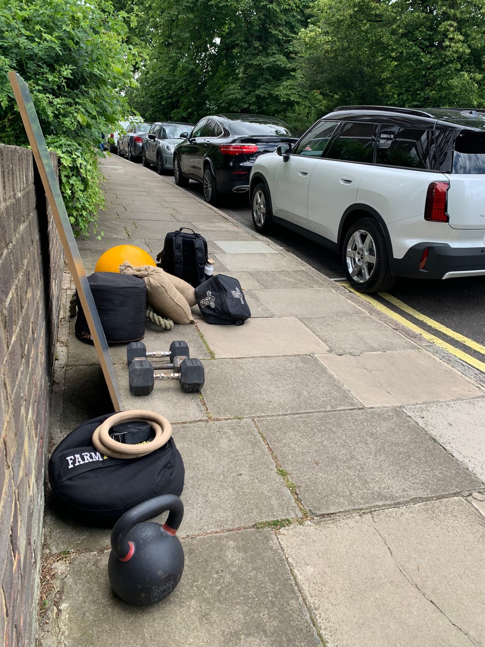 a group of cars parked on the side of a road