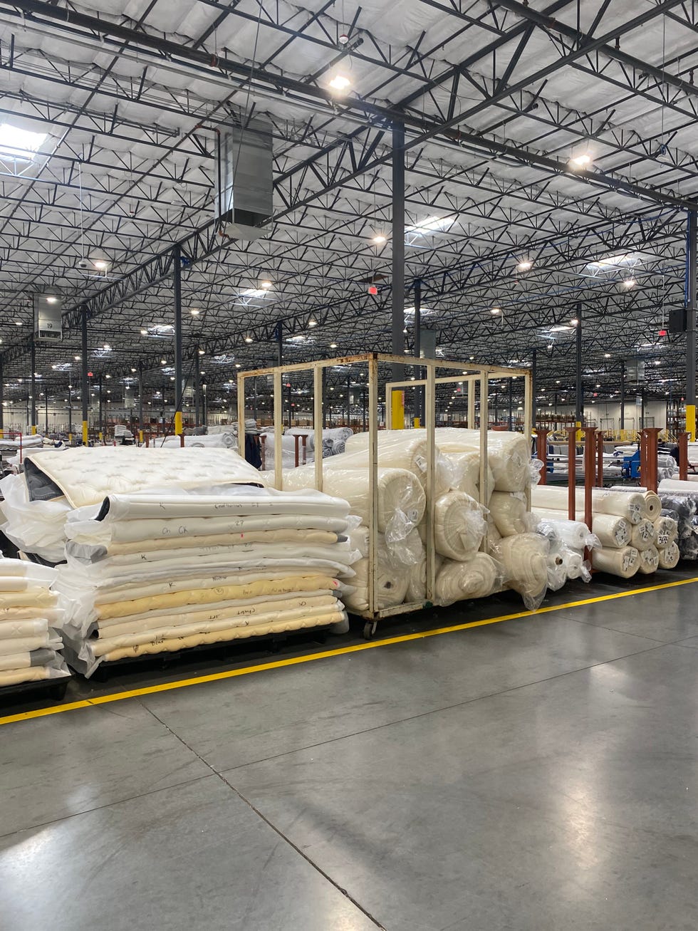 an image of materials being used inside a mattress factory