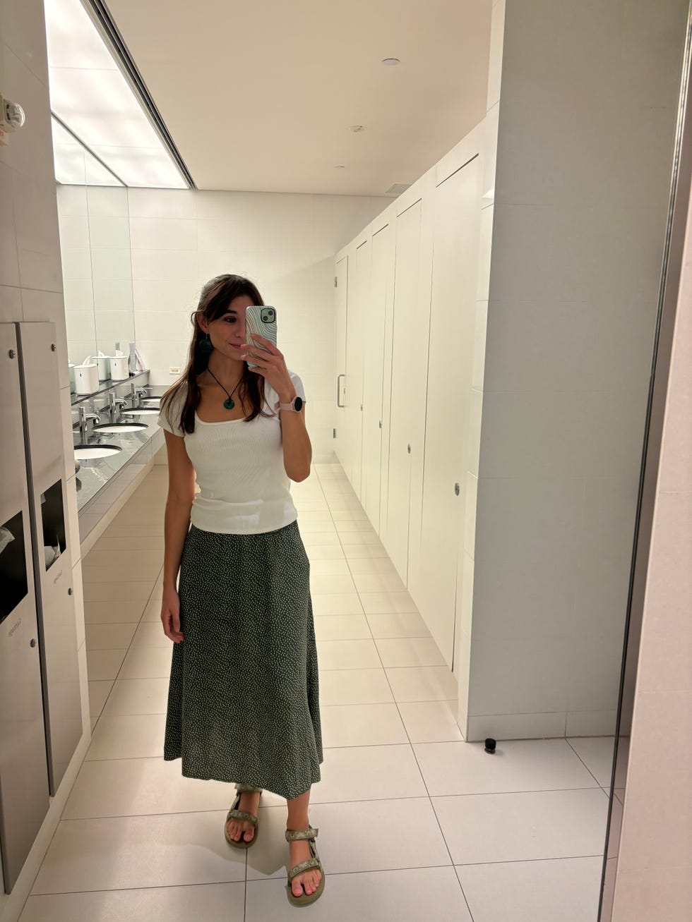 isabella wearing the teva women's original universal sandals