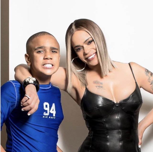 singer faith evans poses with her son, ryder