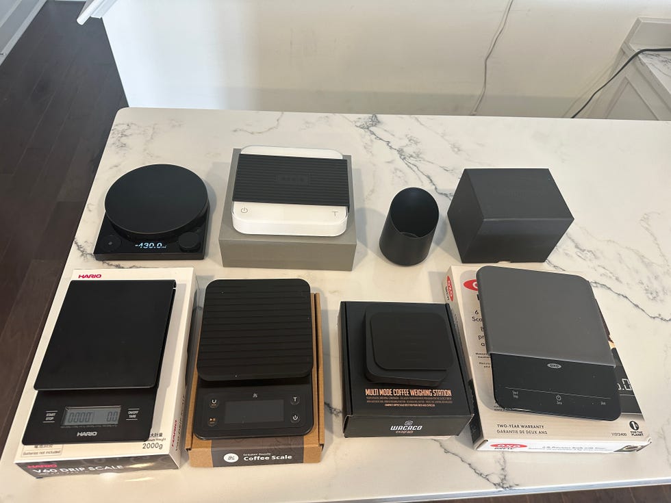 coffee scales next to eachother on a countertop