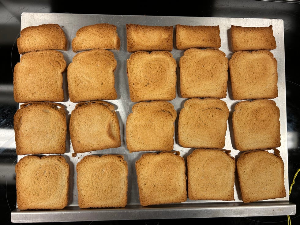 toasted bread on a sheet pan during a good housekeeping lab test of electric ovens