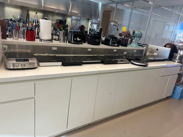 kitchen countertop with various portable induction cooktops