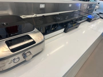 various cooking appliances on a countertop including induction cooktops