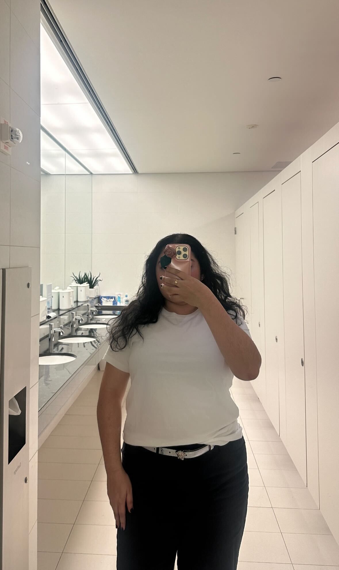 selfie taken in a modern restroom