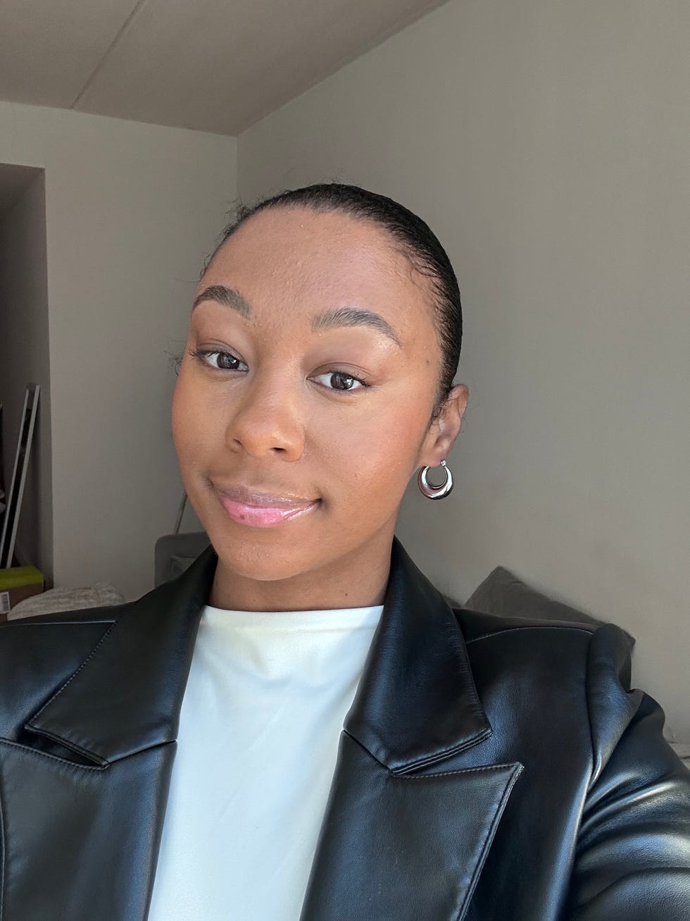 gh staff writer cameron jenkins wearing elf glow reviver lip oil in shade pink quartz