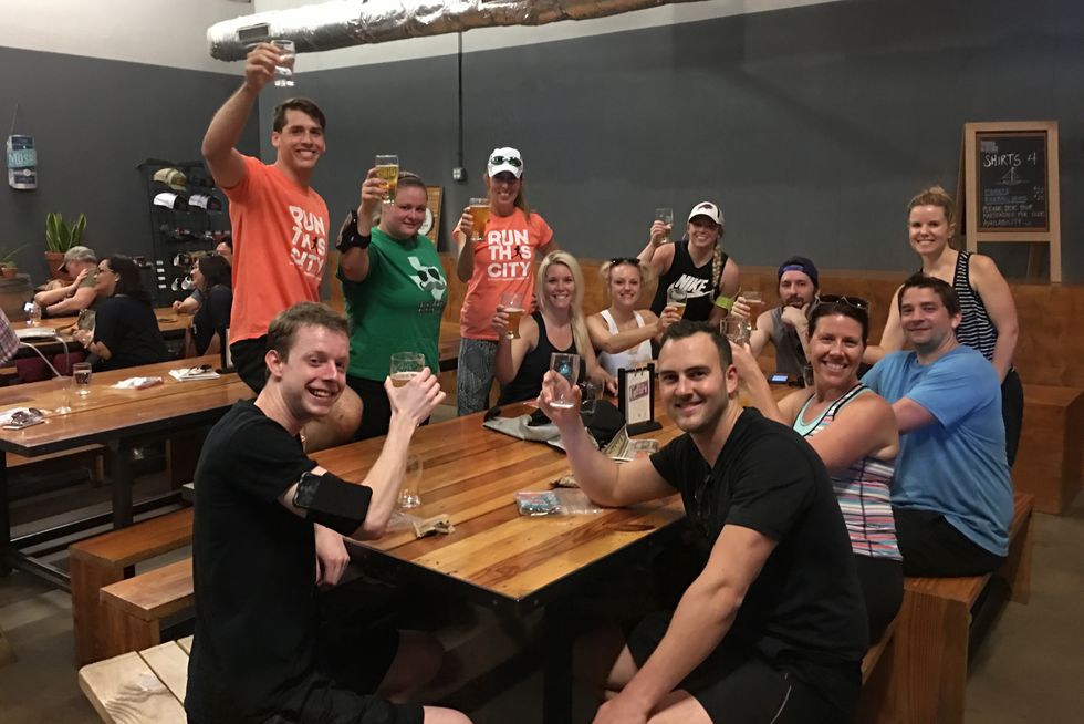 Runners enjoy a beer after a City Running Tour in Austin, TX