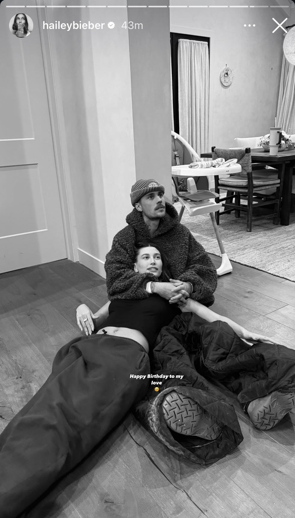 couple sitting on the floor celebrating a birthday