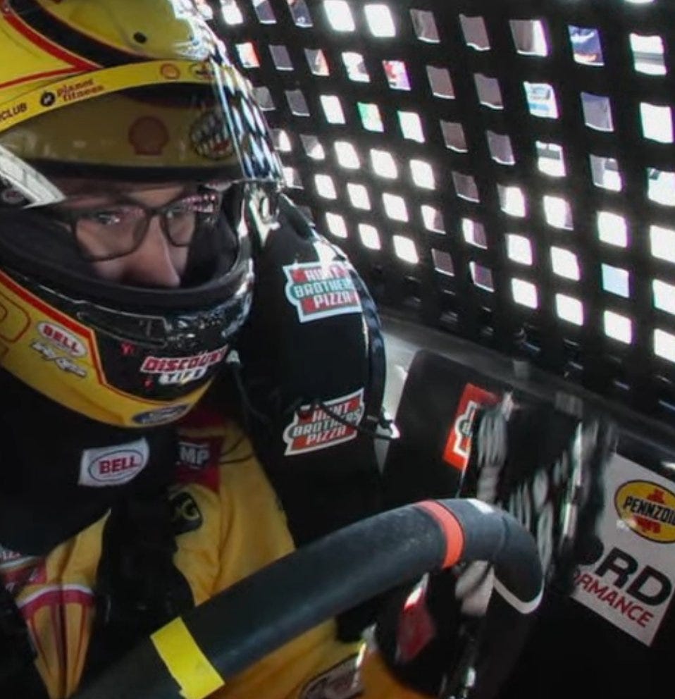 in car shot of joey logano's altered driver glove