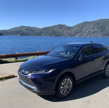 2024 toyota venza parked on a road by a body of water