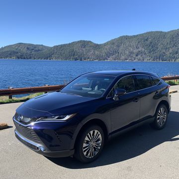 2024 toyota venza parked on a road by a body of water