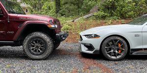 ford mustang mach 1 facing jeep wrangler 392
