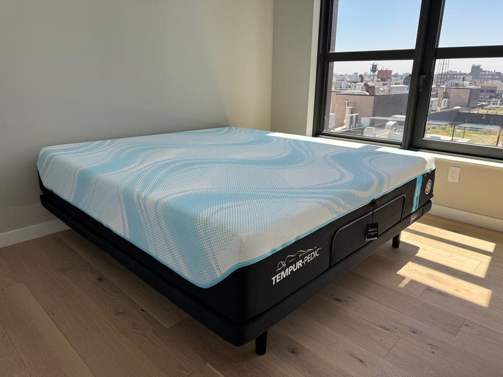 a luxe breeze mattress from tempur pedic in an empty bedroom setup