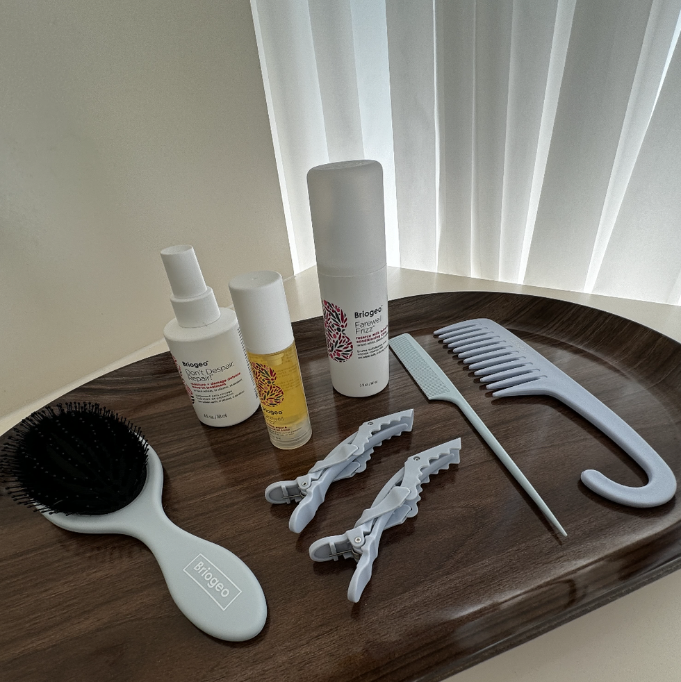a table with a variety of dental tools and a toothbrush