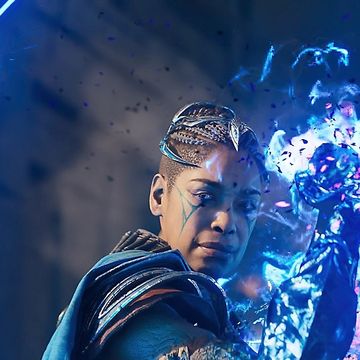 immortals of aveum, gina torres in armour and a cape, wielding a blue fire magic spell in her hand