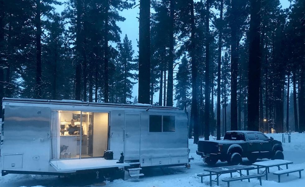 living vehicle camping trailer in snow