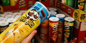 In this photo illustration a Pringles Chips seen on a store...