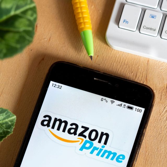 in this photo illustration an amazon prime logo is seen