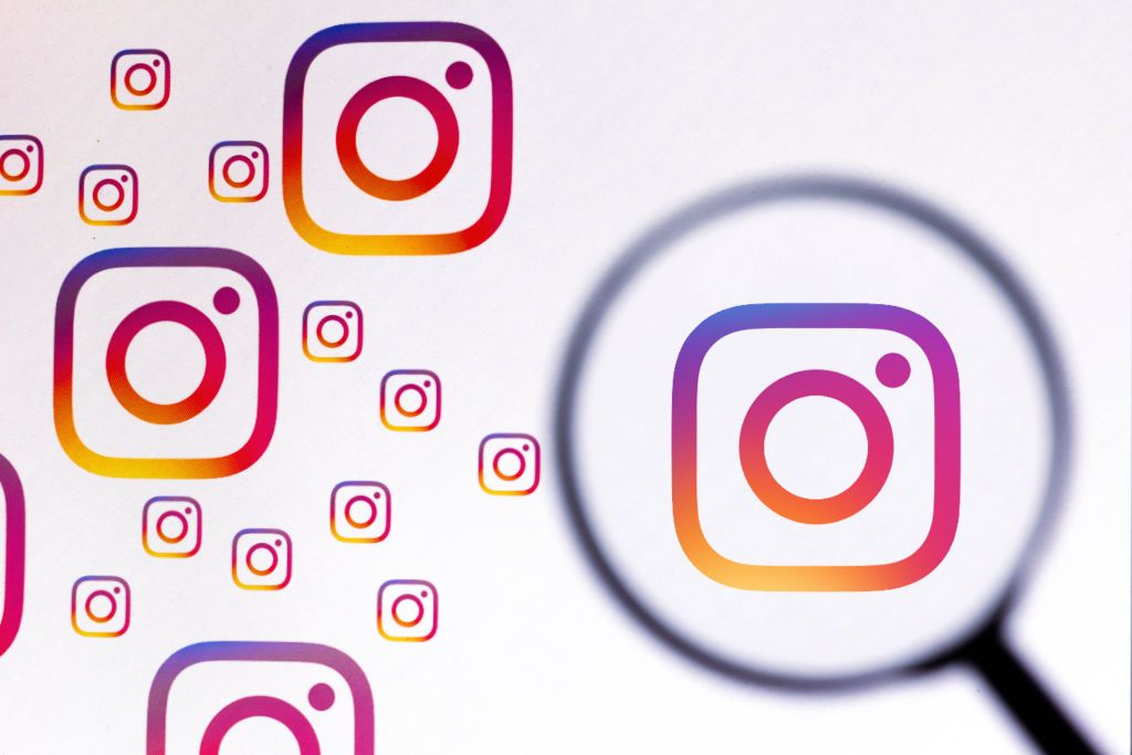 in this photo illustration, an instagram logo seen displayed