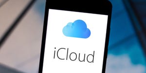 In this photo illustration the iCloud logo is displayed on a...