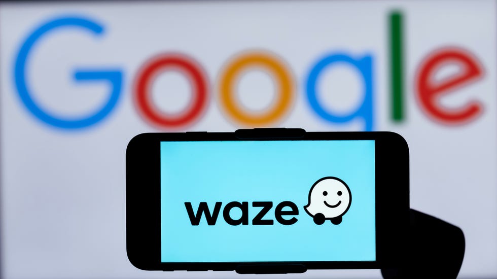 in this photo illustration, the logo of waze is seen