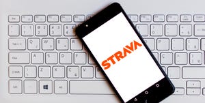 strava logo displayed on a smartphone