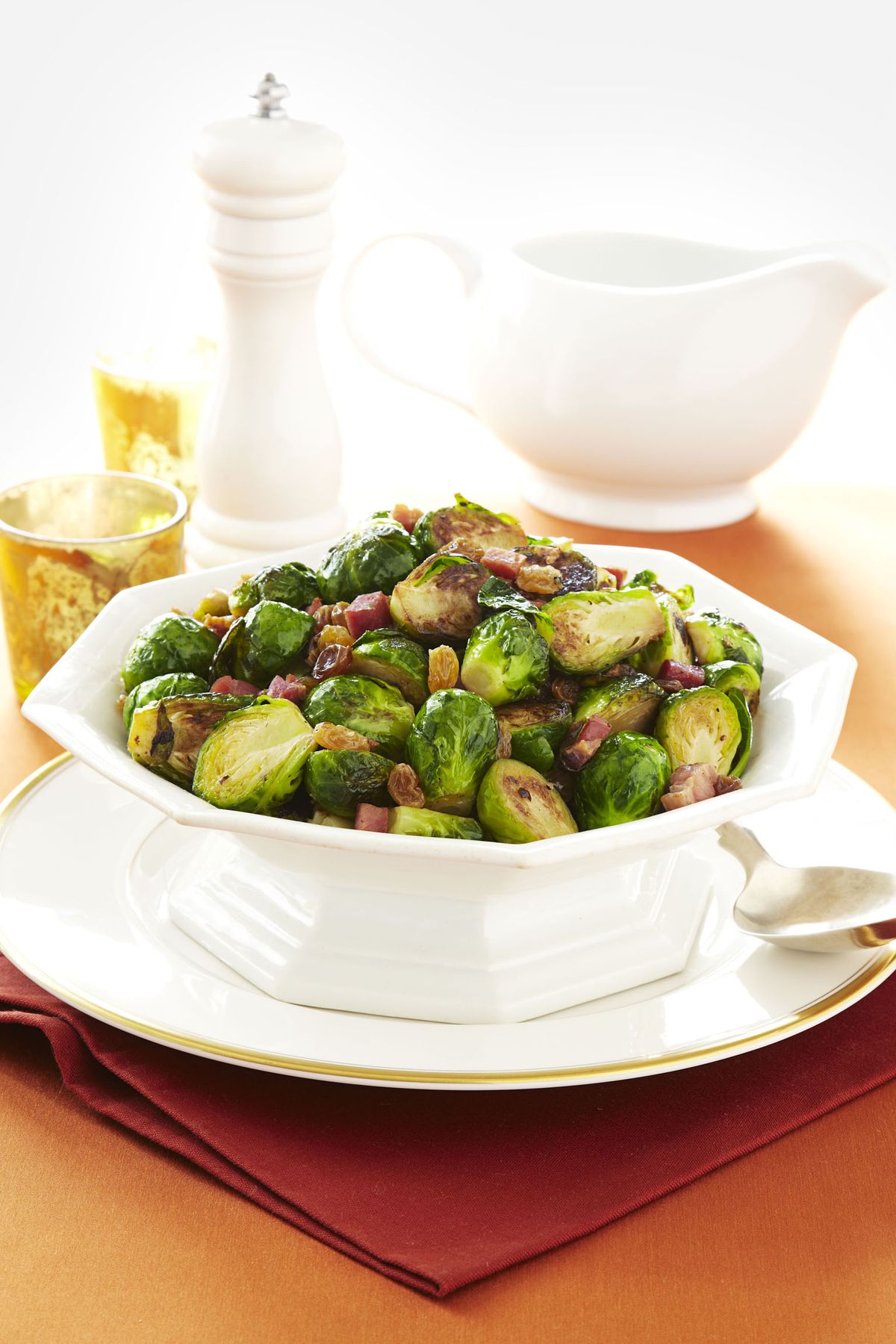 brussels sprouts with pancetta in a white bowl