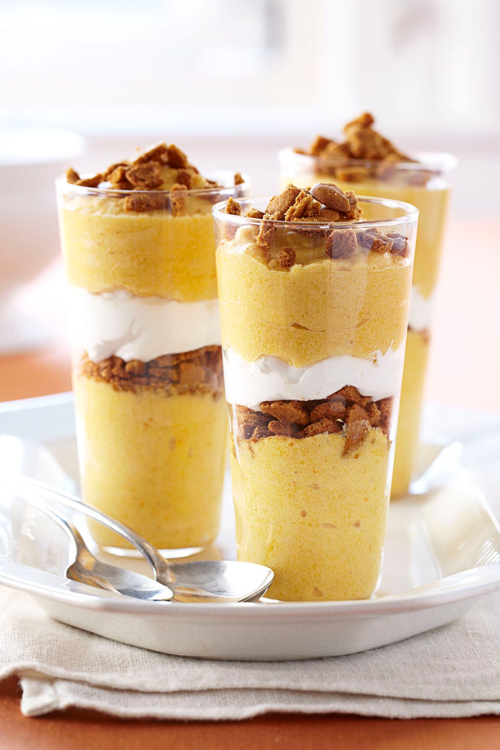 pumpkin mousse parfaits in tall glasses