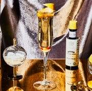 Yellow, Alcohol, Drink, Distilled beverage, Alcoholic beverage, Liqueur, Champagne, Liquid, Glass bottle, Champagne stemware, Yellow, Alcohol, Drink, Distilled beverage, Alcoholic beverage, Liqueur, Champagne, Liquid, Glass bottle, Champagne stemware,