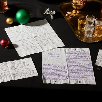 a table with papers and glasses