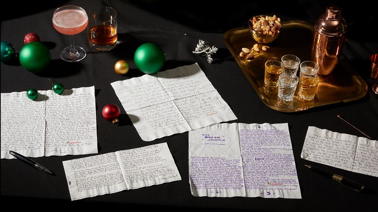 a table with papers and glasses