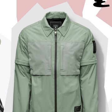 a green jacket and a white shirt