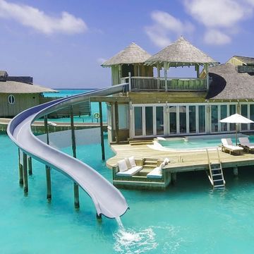 Property, Swimming pool, Resort, Building, House, Vacation, Real estate, Leisure, Home, Sunlounger, 