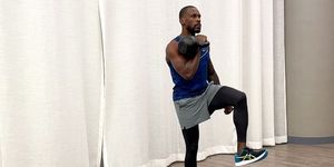 beginner kettlebell workout, jeffers practicing the front racked march exercise