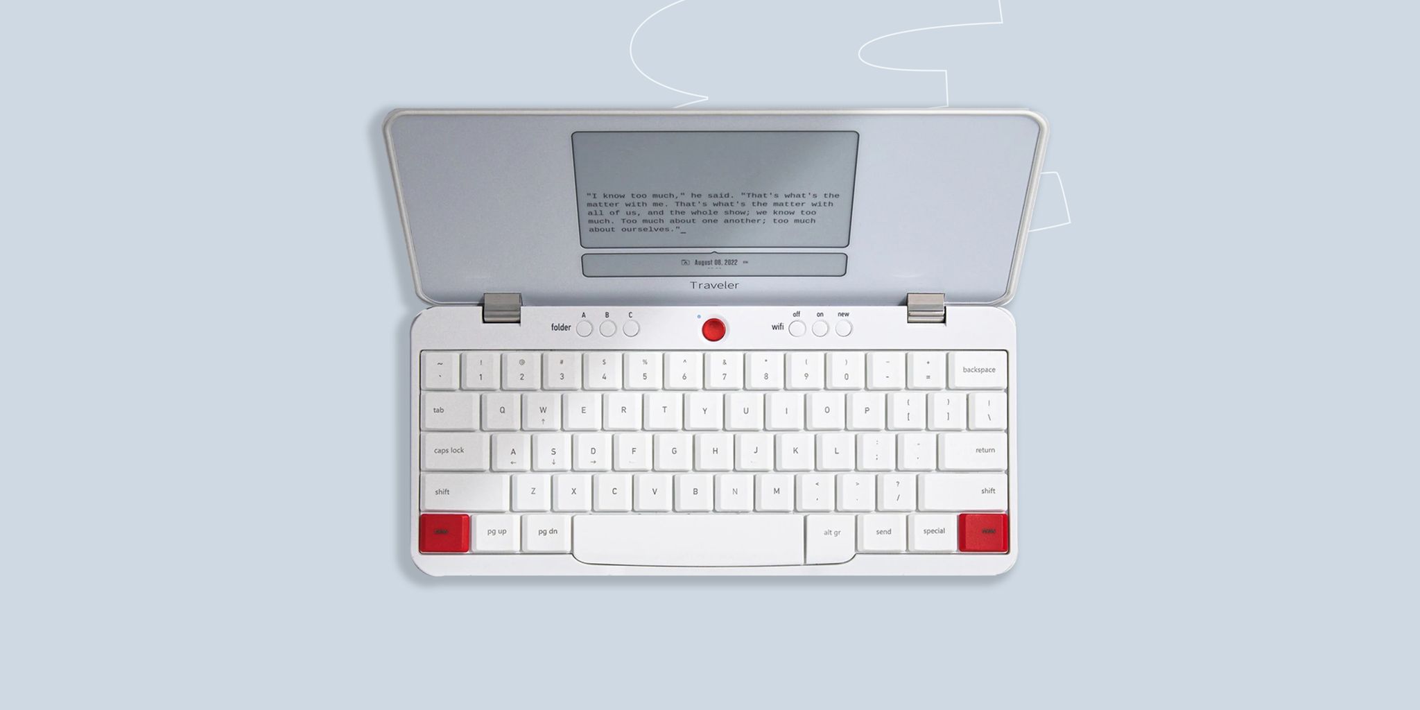 a white computer with a red button