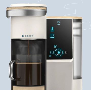 a silver and black coffee machine