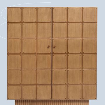 a wooden board with a few holes