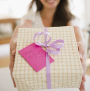 woman holding out mother's day gift