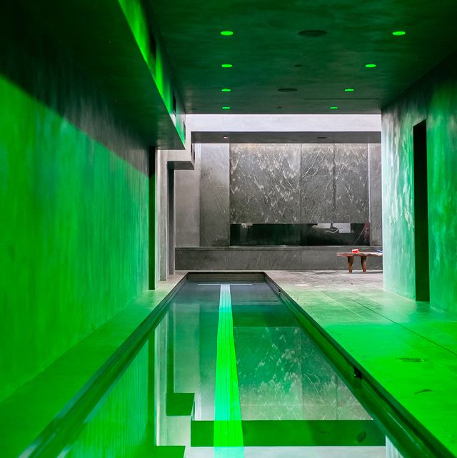 indoor swimming pool with green lights