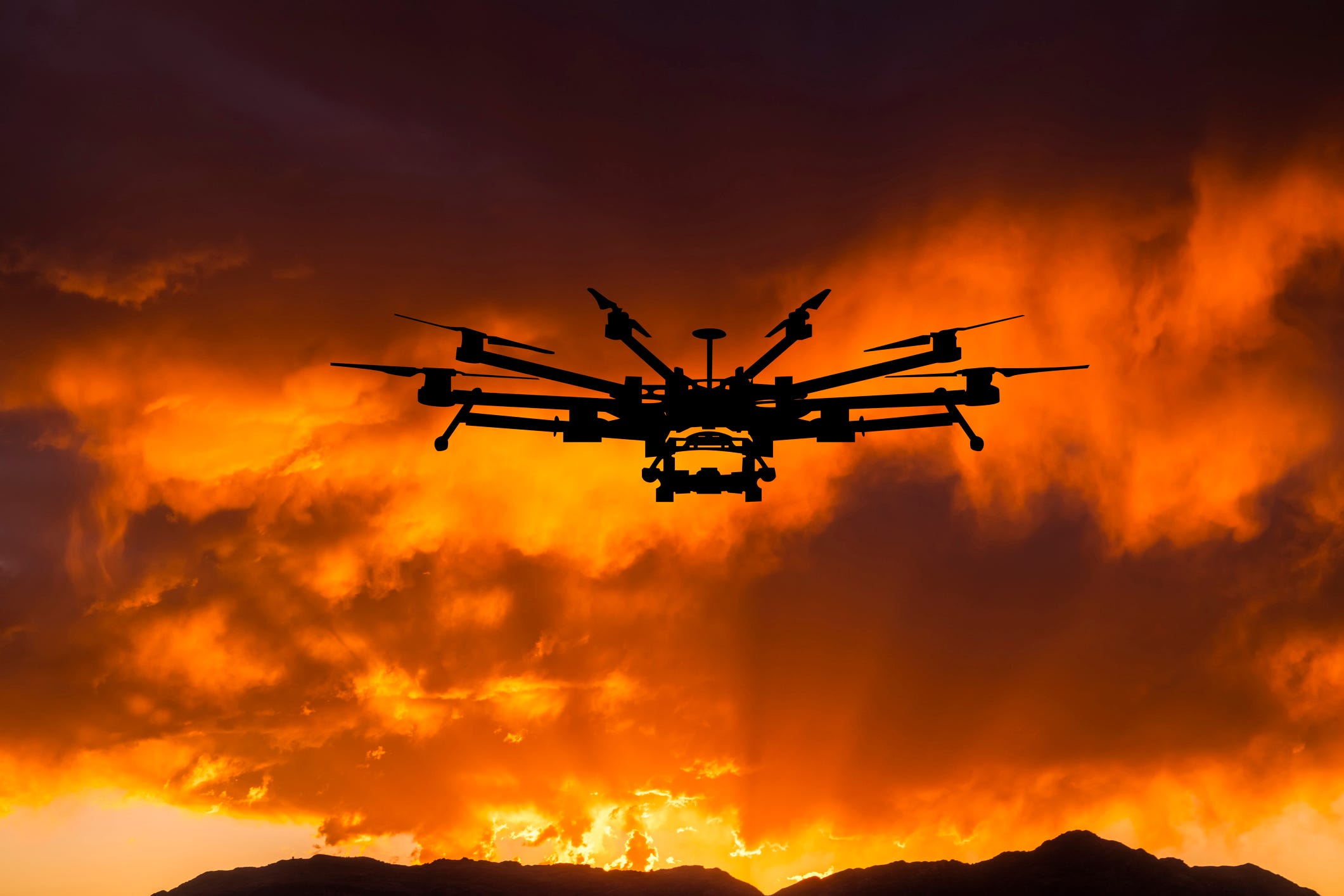 industrial-drone-against-the-sunset-sky-industry-royalty-free-image-1729866586.jpg