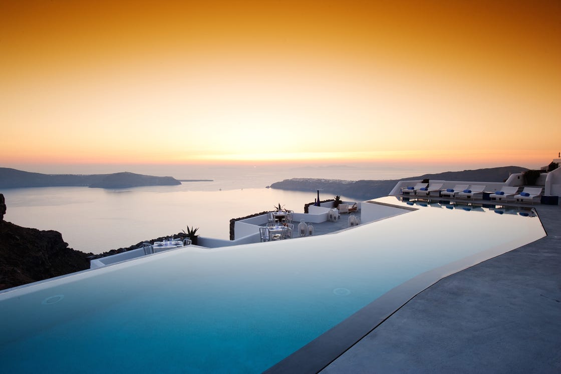 Swim Laps In Santorini's Largest Infinity Pool That Overlooks A Volcano