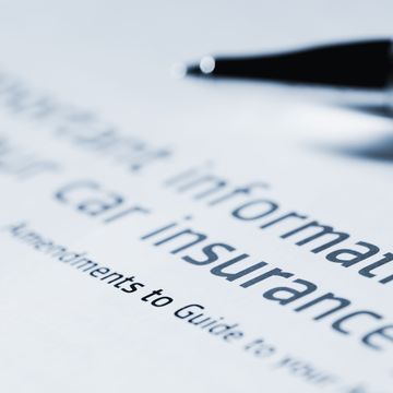 Information for car insurance document with pen