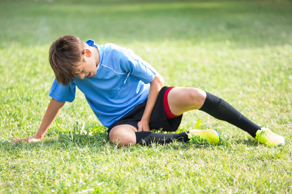 jugador de fútbol lesionado