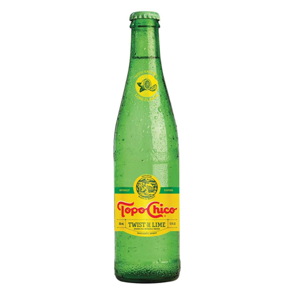 bottle of topo chico twist of lime sparkling water