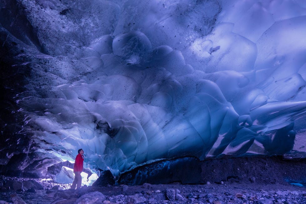 inside the mendenhall ice cave in alaska