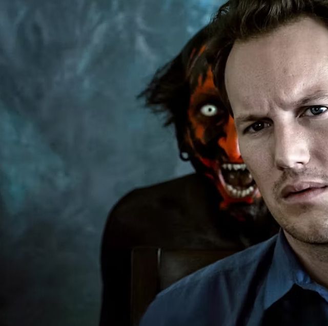 a red faced demon stands behind a man in a scene from the insidious franchise