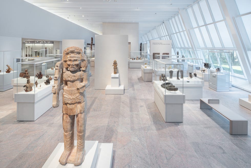 Museum exhibit showcasing various artifacts and sculptures
