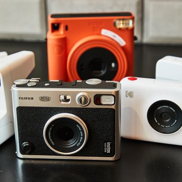 assortment of instant cameras