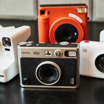 assortment of instant cameras